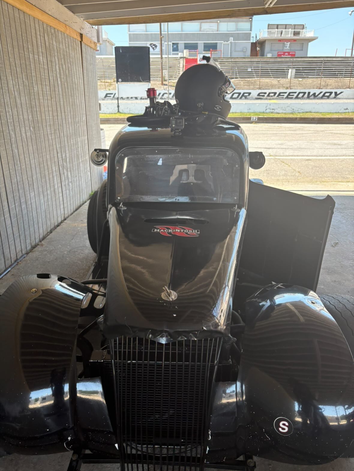 Front view of the race car in pit lane